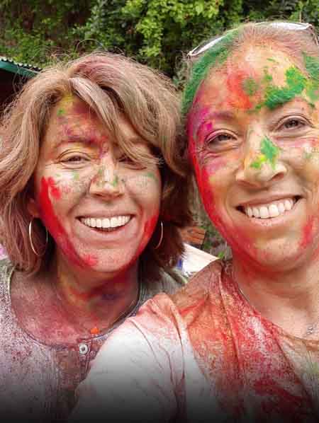 Foreign Tourist all smeared up in the vibrant colours of Holi In Mandawa, Rajasthan I Holi Tour To India