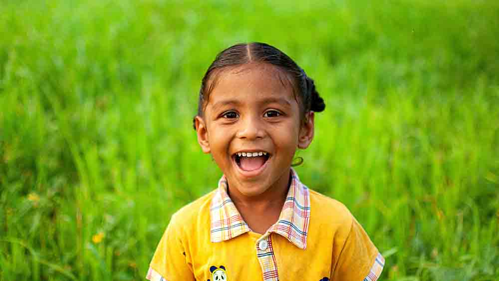 All happy & cute Tamil child in the eco- village of swamimalai in Tamil Nadu I Tamil Nadu Tourism
