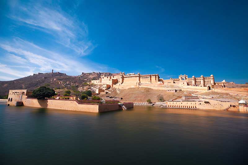 External view of Amer Fort & Moat overlooking Lake Maota, Jaipur, Rajasthan I Jaipur Amber Fort I Travel India